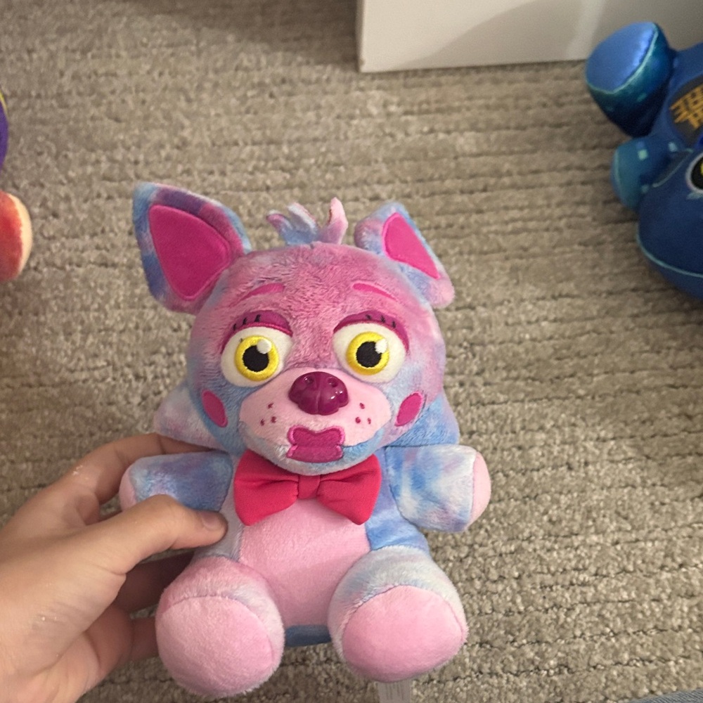 Pink and Blue Stuffed Animal with Bow Tie